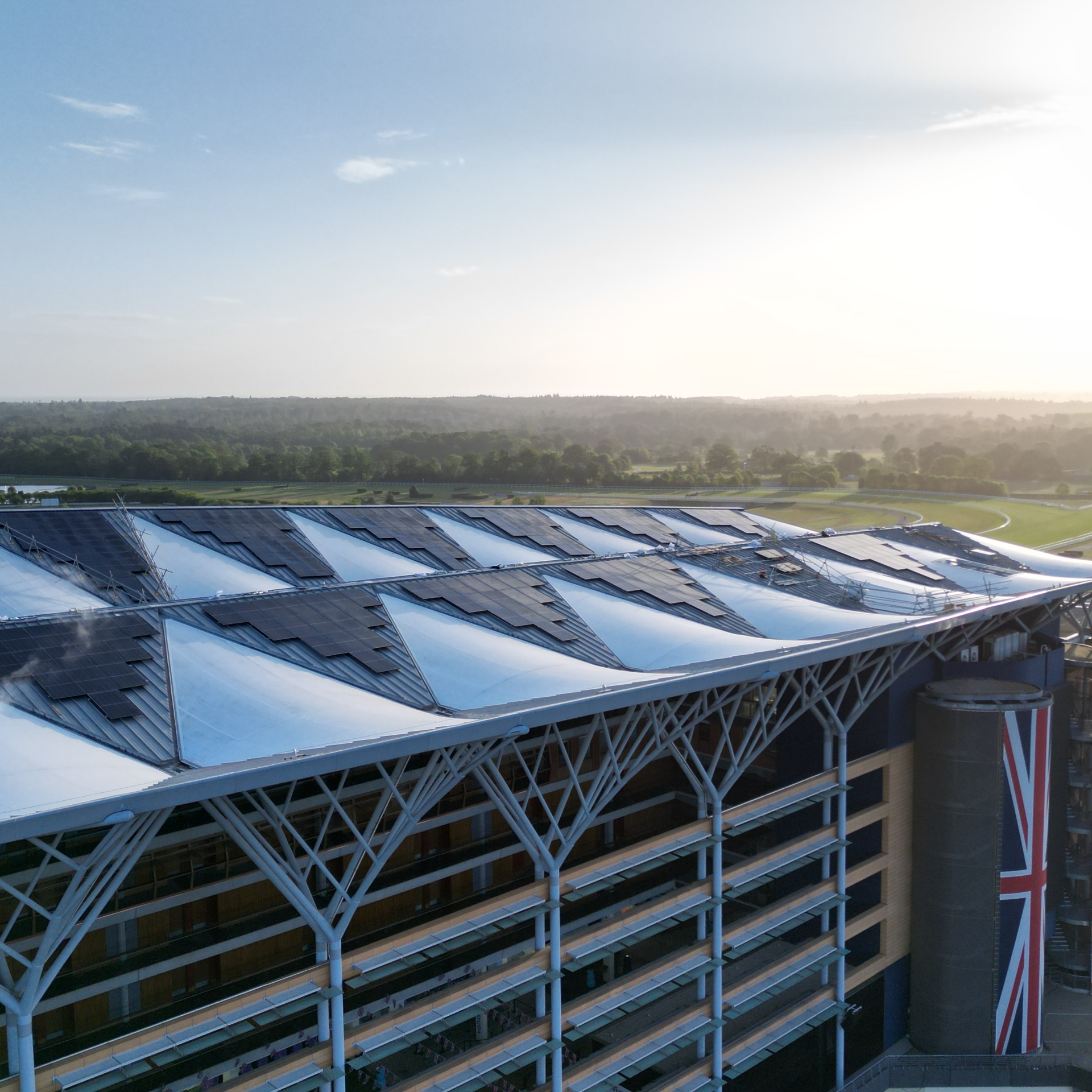 Rooftop solar panels installed on the grandstand at Ascot Racecourse for Ortus Energy’s commercial solar project
