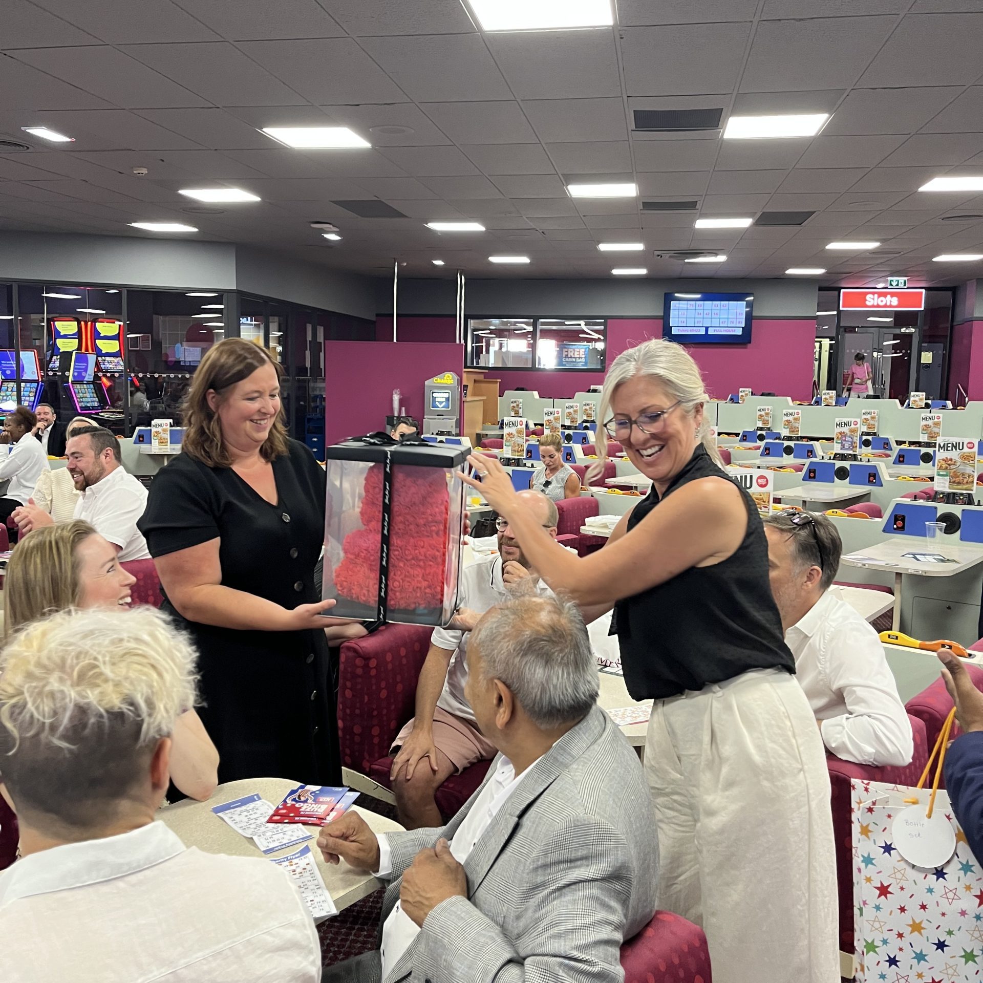 Emma Powell presenting prize at the Basildon Business Leaders breakfast briefing at Buzz Bingo