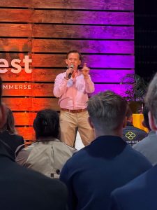 Richard speaking: Richard Willis, co-founder of Attract & Engage, presenting 'Stop Marketing, Start Being Chosen' at BizzFest 2.0