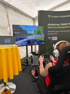F1 sim: Visitors racing on the Attract & Engage F1 simulator at BizzFest 2.0
